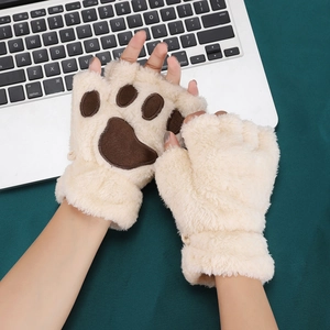 Detailed plush texture of cat paw fingerless gloves with soft white fur and brown pads