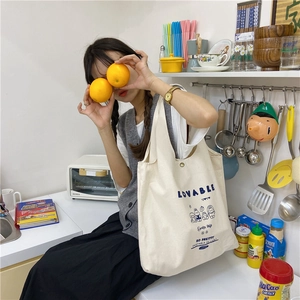 Sac fourre-tout minimaliste en toile beige avec imprimé lapin mignon et fermoir en métal