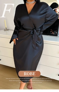 Detail view of the sleek black satin robe with a matching waist tie and V-neckline
