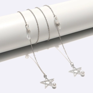 Silver star pendant eyewear chain with pearls and silicone loops on white display