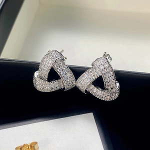 Geometric hollow triangle stud earrings with sparkling pave zircon in silver finish