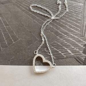 925 sterling silver hollow heart necklace with zircon pave setting on cross chain
