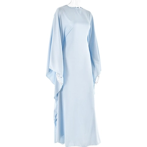 Detail of light blue satin maxi dress showing loose batwing sleeves and smooth drape