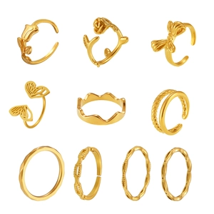 10-piece gold irregular stackable ring set with floral butterfly and geometric designs