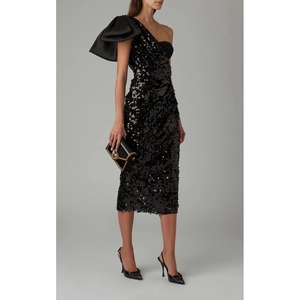 Elegant black sequin one-shoulder dress with oversized satin bow detail for parties
