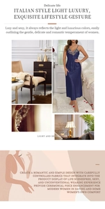 Détail de la nuisette longue en satin bleu marine avec broderie en dentelle et bretelles