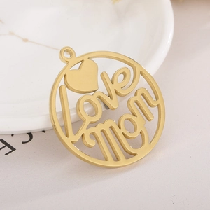 Detailed view of a golden hollow heart pendant with artistic love mom engraving