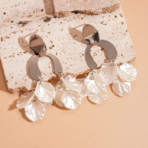 Chic silver earrings with pearl white acrylic petals and sparkling rhinestone tassels