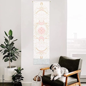 Bohemian sun and moon wall tapestry with pink geometric patterns and grey fringe for decor