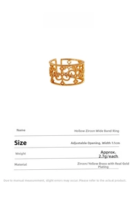 Detail view of gold hollow wide ring with zircon inlay and adjustable brass band