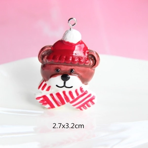 Close-up of resin Christmas bear pendant with red hat and scarf, size 2.7x3.2cm