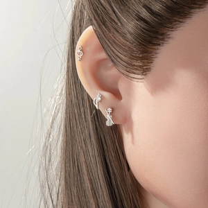 Three-piece silver music note ear studs featuring treble clef and violin designs