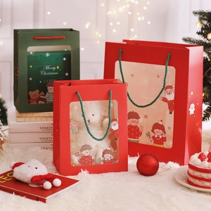 Christmas hollow window gift bags in red and green festive colors with handle