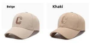 Detail view of beige and khaki baseball caps with high-quality C letter 3D embroidery