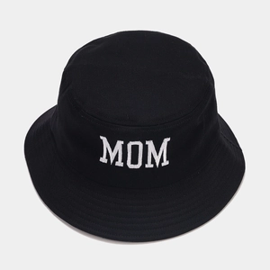 Close-up of white MOM embroidery on a high-quality black cotton bucket hat