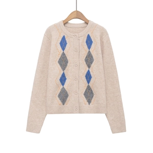 Women's beige crewneck cardigan with blue diamond pattern and contrast buttons