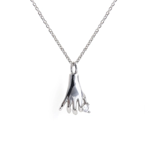Silver hand-shaped pendant necklace with micro-set zircon in a celestial tarot style