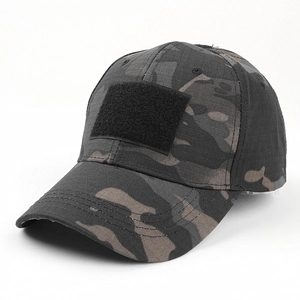 Close-up of tactical camouflage baseball cap featuring a large black Velcro front panel