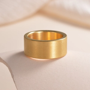 Minimalist 10mm matte gold titanium steel band with a brushed metal finish for men and women