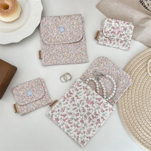 Floral print fabric storage pouches with snap buttons for coins and jewelry in two sizes