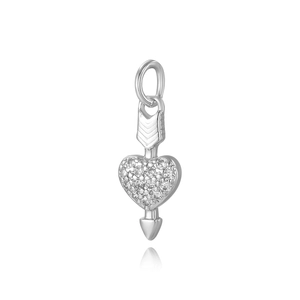 Close-up of a silver heart-shaped pendant with arrow detail and sparkling crystals