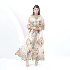 Floral print maxi dress with stand collar and lantern sleeves on a studio model