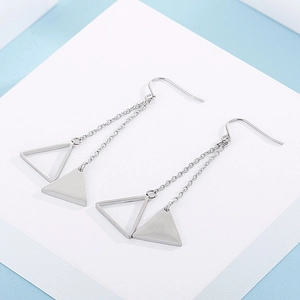 Detail of silver geometric triangle dangle earrings with long delicate double chains