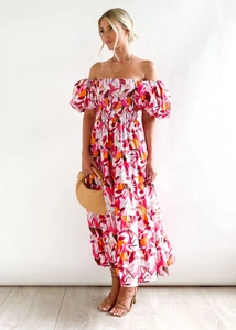 Detail of off-shoulder floral maxi dress with smocked bodice and layered puff sleeves