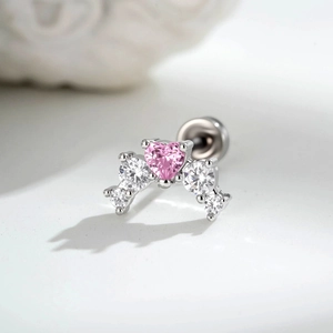 Titanium steel stud earring featuring pink heart zircon and arched clear stones