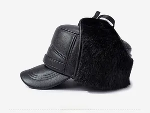Detail view of winter earflap hat featuring black pebble leather and thick faux fur lining