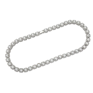 Close-up of silver Cuban link necklace featuring square-cut crystals and clasp detail