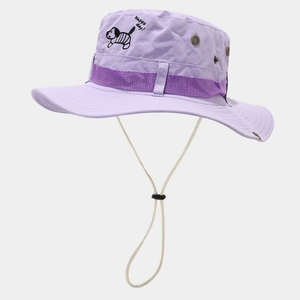 Detail of purple outdoor bucket hat showing dog embroidery and metal ventilation eyelet