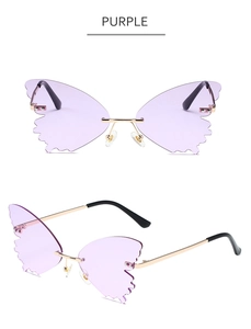 Detail of purple butterfly wing rimless sunglasses with wave-cut lenses and gold metal frame