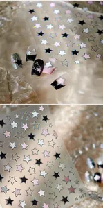 Macro detail of M-977 holographic star nail stickers in black white and pink colors