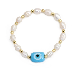 Detail of freshwater pearl bracelet with golden beads and a blue evil eye lucky charm