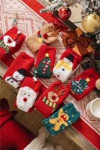 Detailed Christmas theme coral fleece socks with various holiday embroidery and colors