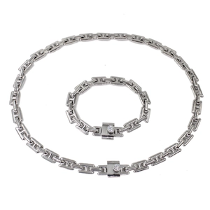 Polished silver link necklace and bracelet set with stone detail and H-link design