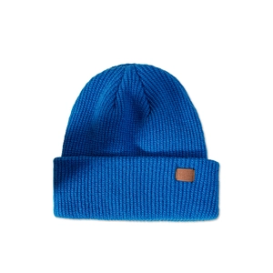 Close-up of royal blue knitted beanie texture with brown leather patch detail