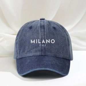 Vintage navy blue washed denim baseball cap featuring white Milano Italy printed text