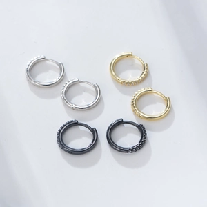 Three pairs of s925 sterling silver hoop earrings in silver, gold, and black with zircons