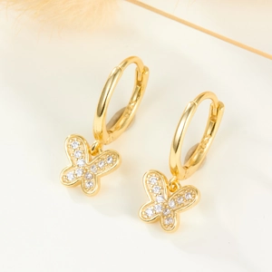 Élégantes boucles d'oreilles papillon en argent 925 avec plaquage or et cristaux