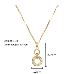 Detailed view of gold interlocking double ring necklace with pave crystal stones