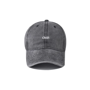 Detail of white Chili embroidery on dark gray washed vintage cotton baseball cap