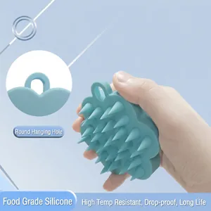 Blue silicone scalp massager brush with cloud shape and soft bristles for hair washing