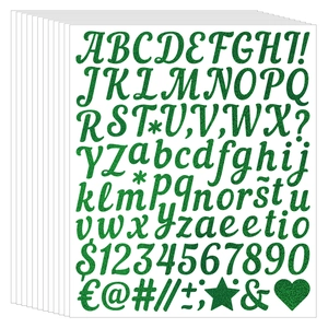 Close-up of glitter green alphabet and number stickers with sparkling adhesive texture
