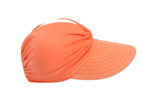 Close-up of vibrant orange sun visor with unique pleated design and breathable texture