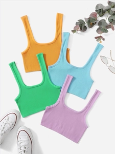 Débardeurs de yoga sans couture à fines côtes en orange, bleu, vert et violet à plat