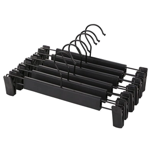 Five black non-marking pants hangers with adjustable clips for skirts and trousers