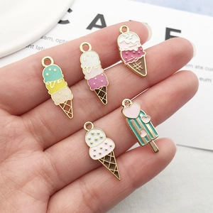 Handheld assorted colorful enamel ice cream cones and popsicle pendants for DIY jewelry
