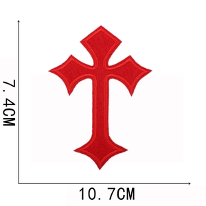 Detailed view of red cross embroidery patch showing 10.7x7.4cm dimensions on white background